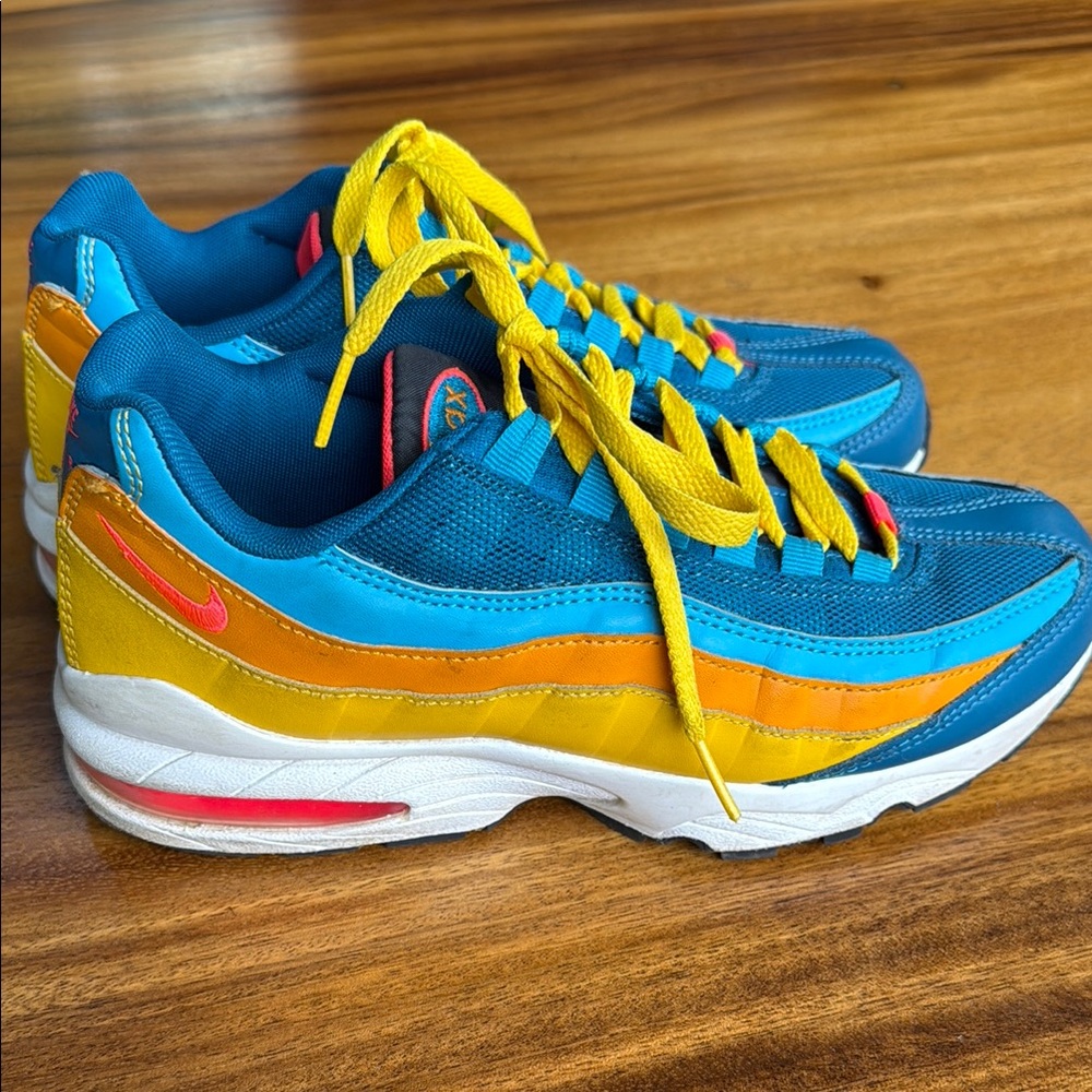 Nike Blue and Yellow Sneakers with Pink Accents